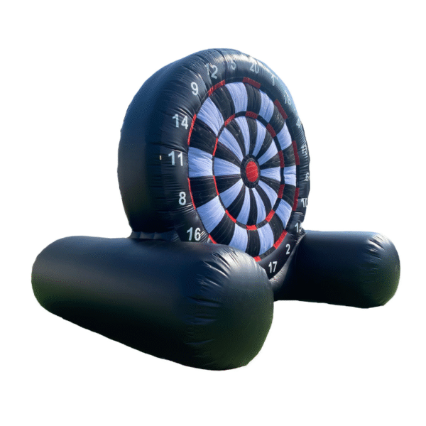 Children kicking velcro soccer balls at giant inflatable dartboard game