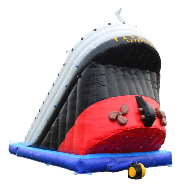 Children sliding down the inflatable Titanic Waterslide at a party